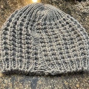 Gray crochet style hat.